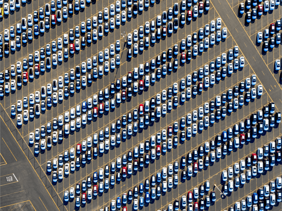 aerial-view-of-a-car-distribution-centre-new-cars-2025-04-05-01-39-15-utc.png